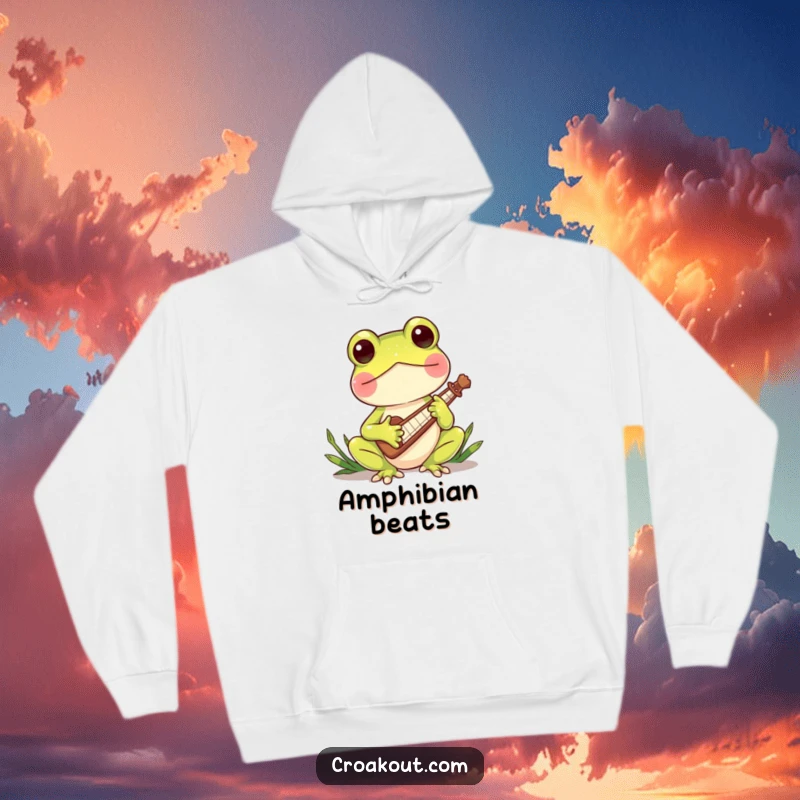 Funny hoodie depicting a charming frog character playing a miniature reed instrument, perfect for music lovers who appreciate whimsical designs.