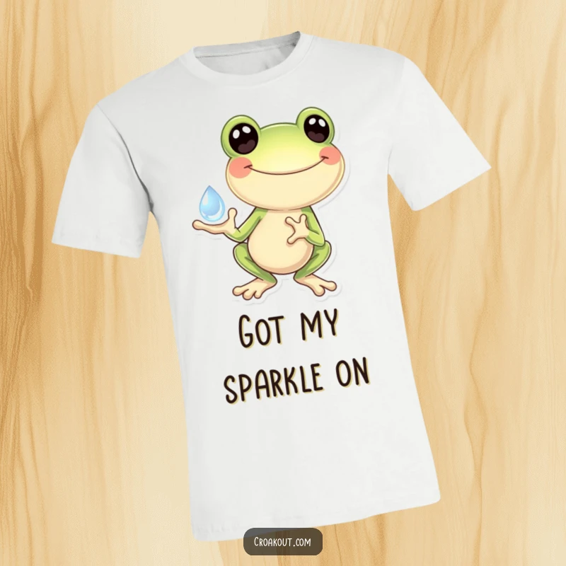 Funny Frog T-Shirt: A design featuring a frog holding a shimmering dewdrop, eyes wide with happiness and a look of pure delight.
